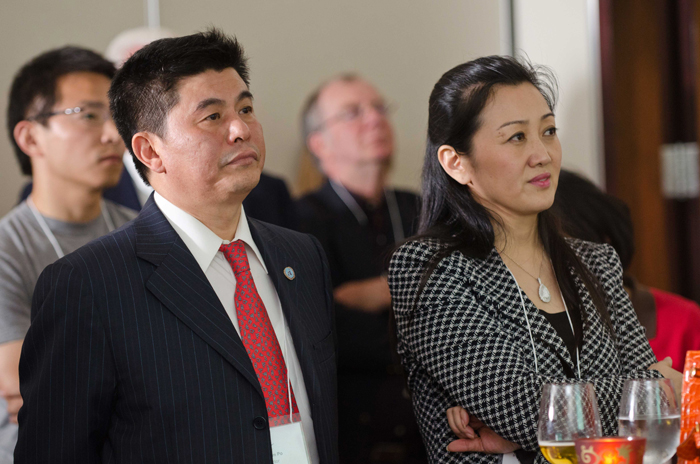 Linda Lam Kwan, Interim President and CEO, and Yan Kim Po, Chairman of the Board, attentively listen to a presentation about Adex (June 2011).